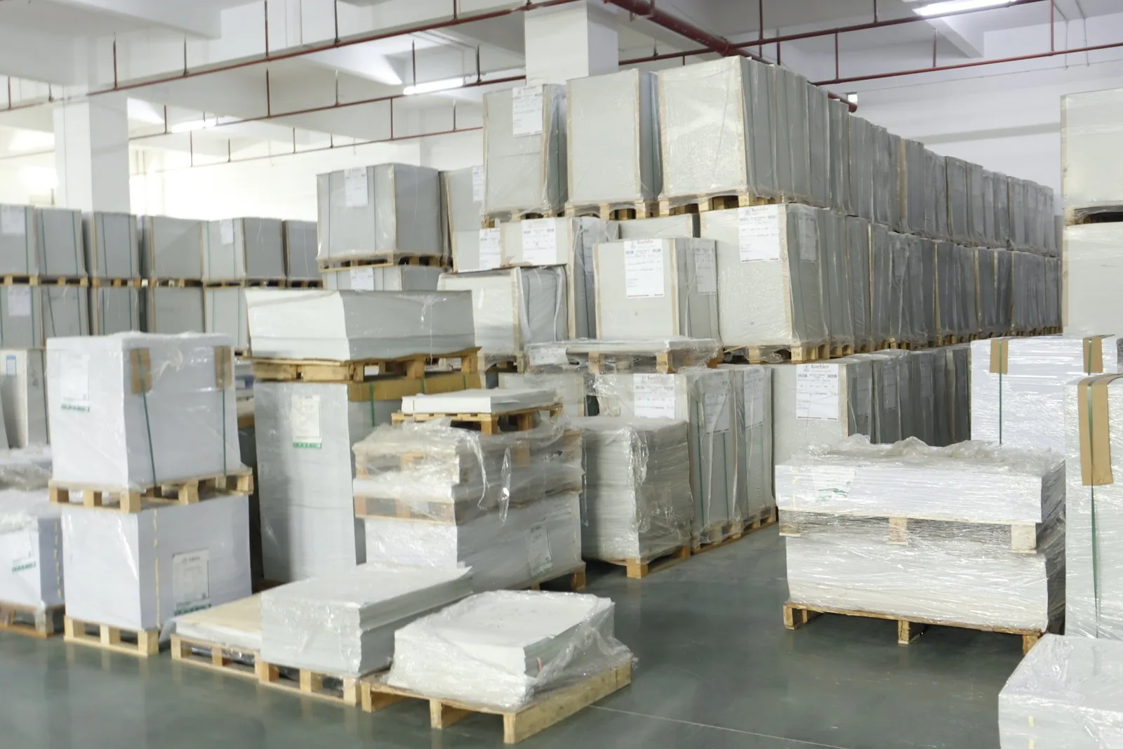 Raw material — card stock held in stock